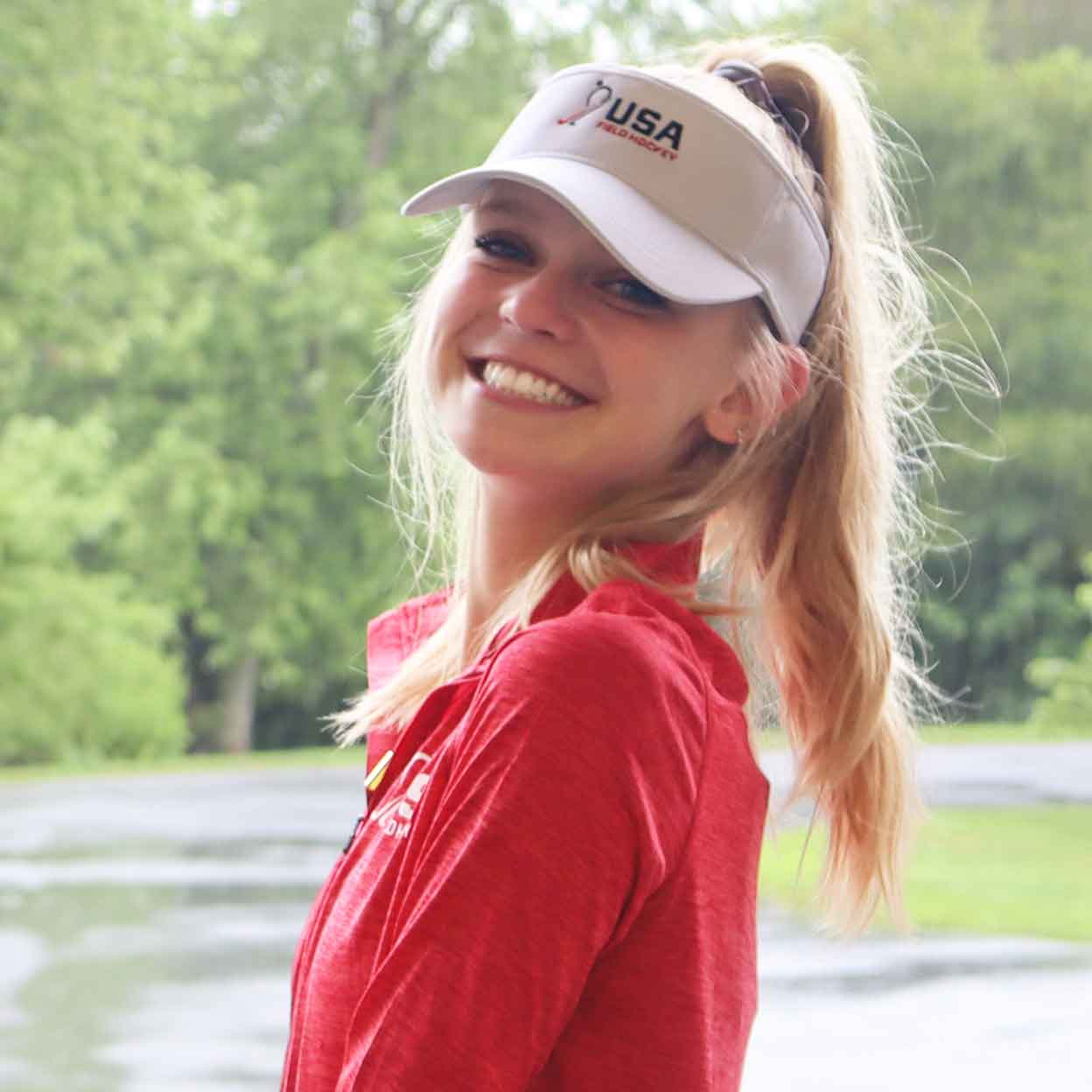 Girl wearing the USA Field Hockey Visor with Embroidered Logo
