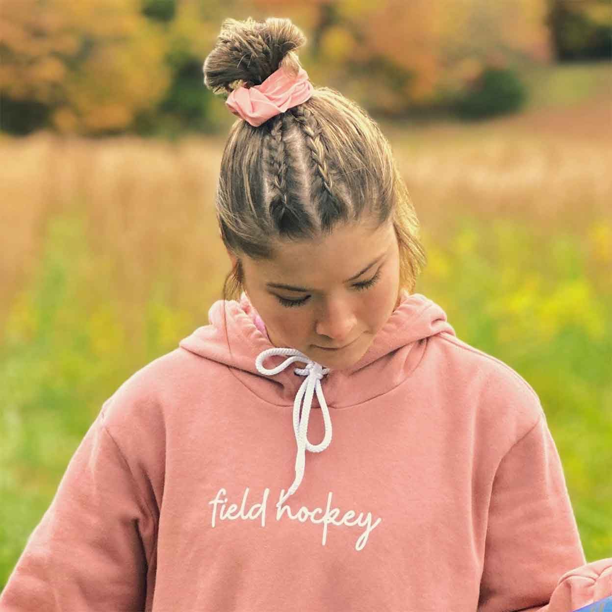 Girl wearing a field hockey scrunchie